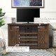 Sliding barn TV stand in brown with barn-style doors, accommodates TVs up to 60", ideal for living room storage.