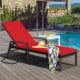 Red adjustable back lounge chair with removable cushion, sturdy steel frame, perfect for outdoor relaxation by the pool.