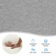 Close-up of light gray upholstered fabric showing breathable texture and soft touch, ideal for accent chair comfort.