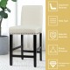 Beige kitchen chair with rubber wood legs, ergonomic backrest, and wide seat for comfortable dining in any setting.