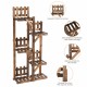 5-tier wood plant stand with slatted shelves, triangular brackets, and hollow design for better air circulation and.