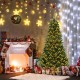 Hinged 6 ft Christmas tree with warm white LED lights and PVC branch tips, perfect for festive home decoration.