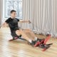 Folding rowing machine in use, showcasing adjustable handrail and control panel for effective home gym workouts.
