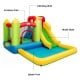 Inflatable bounce house water slide with climbing wall, splash pool, and jumping area for outdoor fun and exercise.