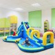 Multifunctional inflatable water bounce in bright colors, featuring slides and ball pit, suitable for 4 kids aged 4-12.