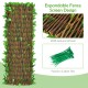 Expandable faux ivy privacy screen fence panel with dense leaves and flowers, ideal for balcony decoration and privacy.