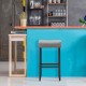 Gray nailhead saddle bar stool with solid rubberwood legs, 29-inch height, perfect for home or bar use.