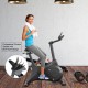 Stationary bike with adjustable seat and magnetic resistance, designed for home gym workouts and stability on uneven.