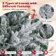 Close-up of snow-flocked leaves on a 6 ft pre-lit artificial Christmas tree, featuring soft PE and vibrant PVC textures.
