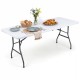 White 6 FT plastic fold-in-half camping table with simulated rattan texture, ideal for events and easy to store.