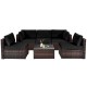 6-piece patio rattan furniture set with black cushions and glass coffee table, perfect for outdoor relaxation.