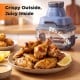 6-in-1 Portable Glass Air Fryer with chicken wings, featuring 95% less oil for healthier cooking.