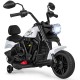 Kids motorcycle in white with training wheels, headlight, and music features for safe, enjoyable riding.