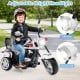 Toddler 3-wheel motorbike ride-on toy in black and white with adjustable headlight, designed for stability and comfort.