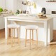 Set of 2 upholstered 27" bar stools with boucle fabric seats and rubber wood frames, ideal for kitchen islands.