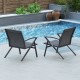 Two grey patio chairs with heavy-duty metal frames, positioned by a pool for outdoor relaxation.