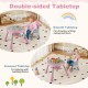 Double-sided tabletop of the pink 16-in-1 baby high chair, featuring smooth and grooved surfaces for various activities.
