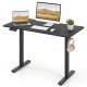 Ergonomic electric standing desk in black, 48"x24", with adjustable height, memory settings, and headphone hook for.