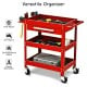 Rolling tool cart in red with three trays, a drawer, and organizer shelf, perfect for garage and home repairs.