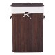 Rectangle bamboo laundry hamper with a thick lid, PU leather handles, and a removable liner for odor control.