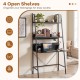 Freestanding black laptop desk with open shelves, ideal for organizing belongings in living room or bedroom.