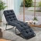 Gray outdoor lounge chaise cushion with high back and string ties, designed for comfort and durability in any setting.