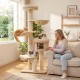 Tall beige cat tree featuring multiple levels, sisal posts, and a hammock, perfect for indoor play and relaxation.