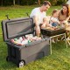 Portable 75 quart hard cooler in gray with wheels, ideal for camping and picnics, featuring 6-day ice retention.