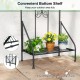 Outdoor metal garden trellis with a foldable bottom shelf, featuring a sturdy black frame for potted plants and garden tools.