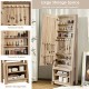 Close-up view of the elegant knob on the freestanding wooden cosmetics storage cabinet for easy access to jewelry.