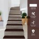 Brown slip-resistant stair treads made of durable polyester, 30 x 8 inches, ideal for indoor safety and noise reduction.