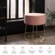 Round pink velvet footrest stool with gold metal frame, compact size, perfect for bedside or as a stylish side table.