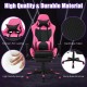 PU leather gaming chair in pink with adjustable armrests, footrest, and USB massage lumbar pillow for ultimate comfort.