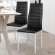 Two black PVC leather dining side chairs with painted steel legs, featuring a modern design for stylish dining.