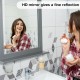 Wall-mounted gray vanity mirror with shelf, featuring high-definition reflection, ideal for bathroom or hallway use.