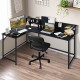 L-shaped black computer desk featuring a minimalist design, adjustable foot pads, and ample storage for a tidy.