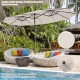 Double-sided 15-foot patio umbrella in beige with solar LED lights, perfect for spacious outdoor coverage and.