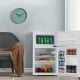 Compact stainless steel refrigerator with adjustable shelves, crisper drawer, and freezer access, ideal for small.