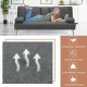 Convertible dark gray futon sofa bed with removable armrests and cup holders, perfect for apartments and versatile use.