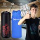 Filled punching boxing set featuring a sturdy sandbag, gloves, and jump rope for training and easy transport.