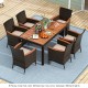 7-piece garden dining patio rattan set with acacia wood table, featuring 6 ergonomic chairs and cushions for backyard.