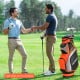 10.5-inch orange golf stand bag with 14 dividers and 7 zippered pockets, ideal for organized club storage on the course.