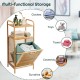 Tilt-out bamboo laundry hamper with 2-tier shelf, removable liner, and natural finish for versatile storage in any room.