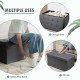 Foldable dark gray storage ottoman with padded seat, ideal for storing clothes and shoes in living room or entryway.