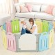 Foldable baby playpen with 14 colorful panels, featuring a safety lock and educational toy panel for safe play.