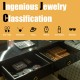 Makeup vanity table set in black with LED mirror, four drawers, and elegant design for stylish storage and organization.
