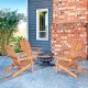 Foldable eucalyptus wood lounger chair with ergonomic design, perfect for outdoor patio relaxation and leisure.