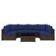 Sectional sofa set with navy cushions, made of PE rattan, includes coffee table, perfect for outdoor patio relaxation.