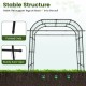 7.5 FT tall black metal garden arch trellis with pointed ends, providing stable support for climbing plants outdoors.