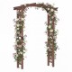 Wooden garden arch trellis in rustic brown with flowers, ideal for climbing plants and outdoor decor.